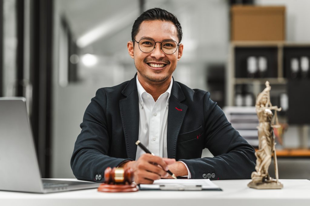 Smiling lawyer doing legal document timestamping.