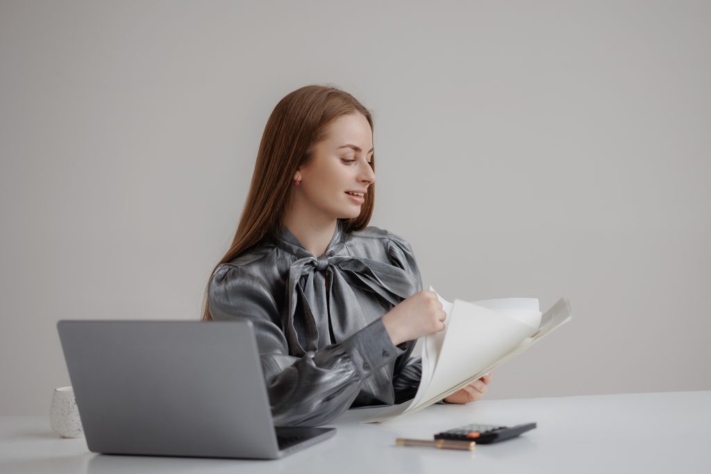 Insurance fraud prevention in action with a laptop.